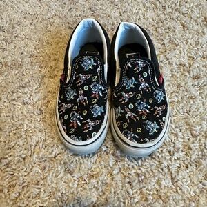 Kids Black Slip-On Vans Shoes with space/rocket/galaxy Print